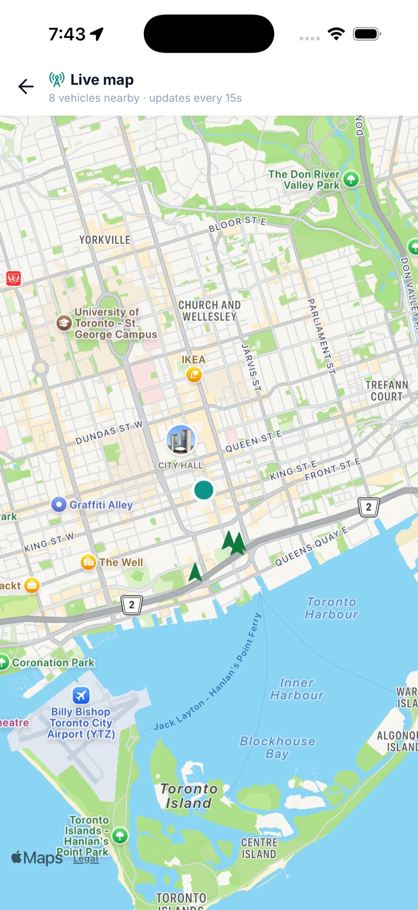 AskTransit live map showing vehicles moving near the rider in downtown Toronto, updating every 15 seconds.